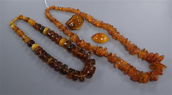 Two amber bead necklaces and a fragment